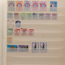 Lot de timbres d'Arabie - Moyen Orient neufs et oblitérés en un album.