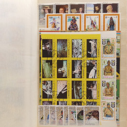 Lot de timbres d'Arabie - Moyen Orient neufs et oblitérés en un album.