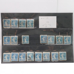 Vrac philatélique de timbres du monde neufs et oblitérés en un carton.