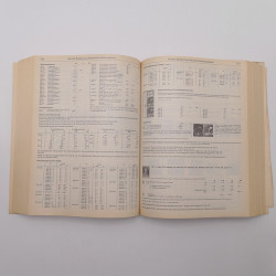 Vrac philatélique de timbres du monde neufs et oblitérés en un carton.