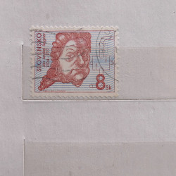 Vrac philatélique de timbres du monde neufs et oblitérés en un carton.