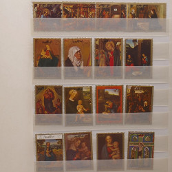 Vrac philatélique de timbres du monde neufs et oblitérés en un carton.