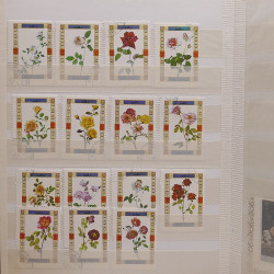 Vrac philatélique de timbres du monde neufs et oblitérés en un carton.