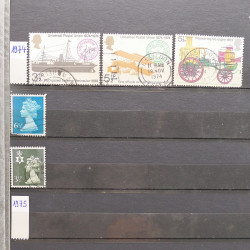 Vrac philatélique de timbres du monde neufs et oblitérés en un carton.