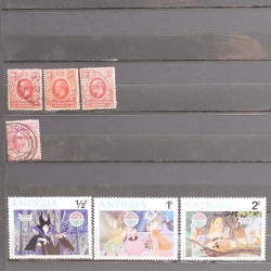 Vrac philatélique de timbres du monde neufs et oblitérés en un carton.