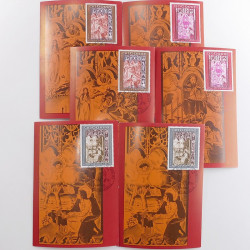 Vrac philatélique de timbres du monde neufs et oblitérés en un carton.