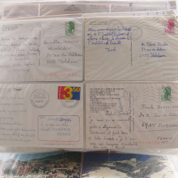 Vrac philatélique de timbres du monde neufs et oblitérés en un carton.