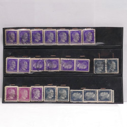 Vrac philatélique de timbres du monde neufs et oblitérés en un carton.