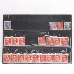 Vrac philatélique de timbres du monde neufs et oblitérés en un carton.