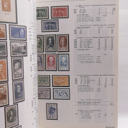 Vrac philatélique de timbres du monde neufs et oblitérés en un carton.