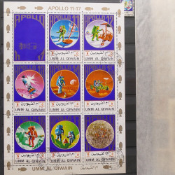 Vrac philatélique de timbres du monde neufs et oblitérés en un carton.