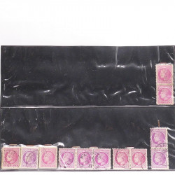 Vrac philatélique de timbres du monde neufs et oblitérés en un carton.