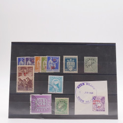 Vrac philatélique de timbres du monde neufs et oblitérés en un carton.