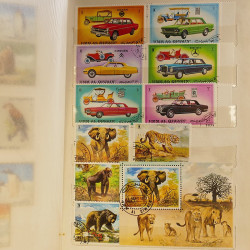 Vrac massif de timbres du monde neufs et oblitérés en un carton.