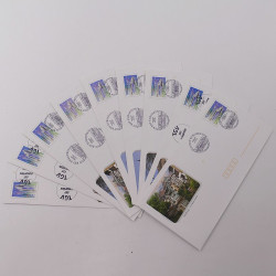 Vrac massif de timbres du monde neufs et oblitérés en un carton.