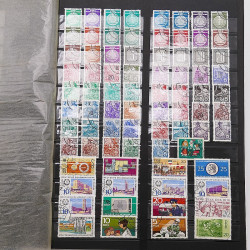 Vrac philatélique de timbres du monde neufs et oblitérés en un carton.