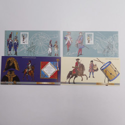 Vrac philatélique de timbres du monde neufs et oblitérés en un carton.