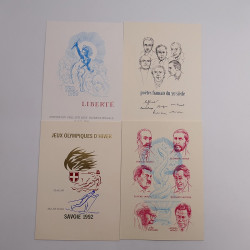 Vrac philatélique de timbres du monde neufs et oblitérés en un carton.