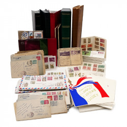 Vrac philatélique de timbres du monde neufs et oblitérés en un carton.