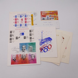 Vrac philatélique de timbres du monde neufs et oblitérés en un carton.