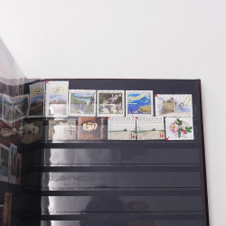 Lot de timbres d'Europe neufs et oblitérés en un album cuir.