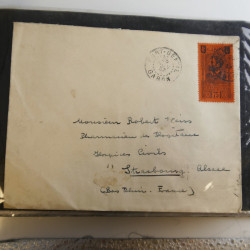 Lot de lettres, entiers postaux de colonies françaises et monde en un album.