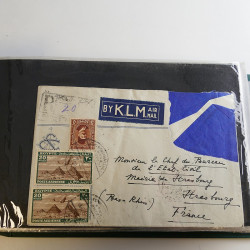 Lot de lettres, entiers postaux de colonies françaises et monde en un album.