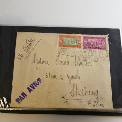 Lot de lettres, entiers postaux de colonies françaises et monde en un album.