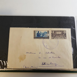 Lot de lettres, entiers postaux de colonies françaises et monde en un album.