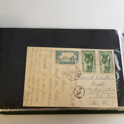 Lot de lettres, entiers postaux de colonies françaises et monde en un album.