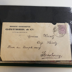 Lot de lettres, entiers postaux de colonies françaises et monde en un album.
