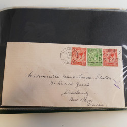 Lot de lettres, entiers postaux de colonies françaises et monde en un album.