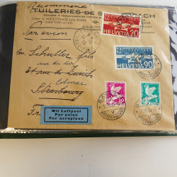 Lot de lettres, entiers postaux de colonies françaises et monde en un album.