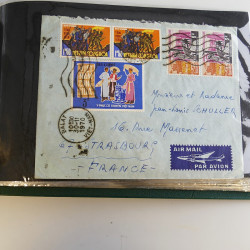 Lot de lettres, entiers postaux de colonies françaises et monde en un album.