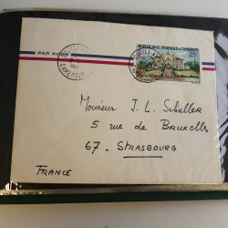 Lot de lettres, entiers postaux de colonies françaises et monde en un album.