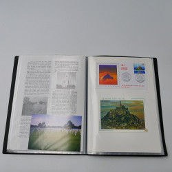 Vrac philatélique de timbres du monde neufs et oblitérés en un carton.