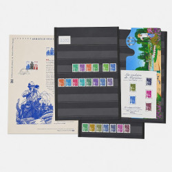 Vrac philatélique de timbres du monde neufs et oblitérés en un carton.