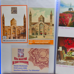 Vrac philatélique de timbres du monde neufs et oblitérés en un carton.