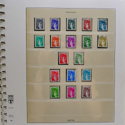 Vrac philatélique de timbres du monde neufs et oblitérés en un carton.