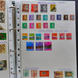 Vrac philatélique de timbres du monde neufs et oblitérés en un carton.
