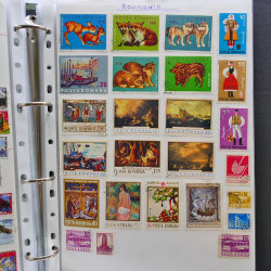Vrac philatélique de timbres du monde neufs et oblitérés en un carton.