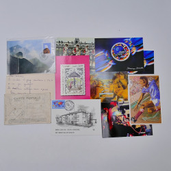 Vrac philatélique de timbres du monde neufs et oblitérés en un carton.