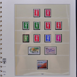 Vrac philatélique de timbres du monde neufs et oblitérés en un carton.
