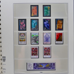 Vrac philatélique de timbres du monde neufs et oblitérés en un carton.