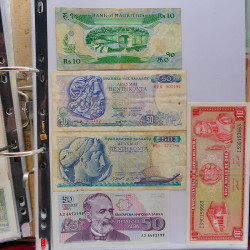 Collection billets de banque tous pays neufs et anciens en un album.