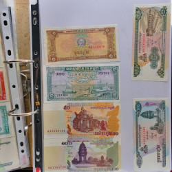 Collection billets de banque tous pays neufs et anciens en un album.