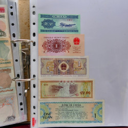 Collection billets de banque tous pays neufs et anciens en un album.