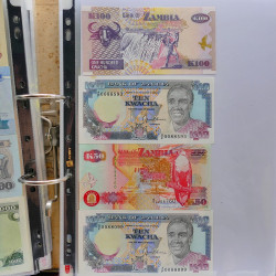 Collection billets de banque tous pays neufs et anciens en un album.