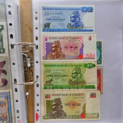 Collection billets de banque tous pays neufs et anciens en un album.