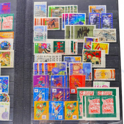 Lot massif de timbres de France oblitérés en 12 albums.